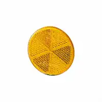 Catadioptre jaune collé